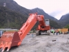 Manapouri power scheme, Deep Cove, Hitachi UH801 with long reach boom & dipper arm